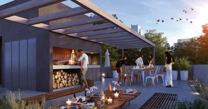 Terraza exterior con parrilla y amigos disfrutando de una reunion con comida Way