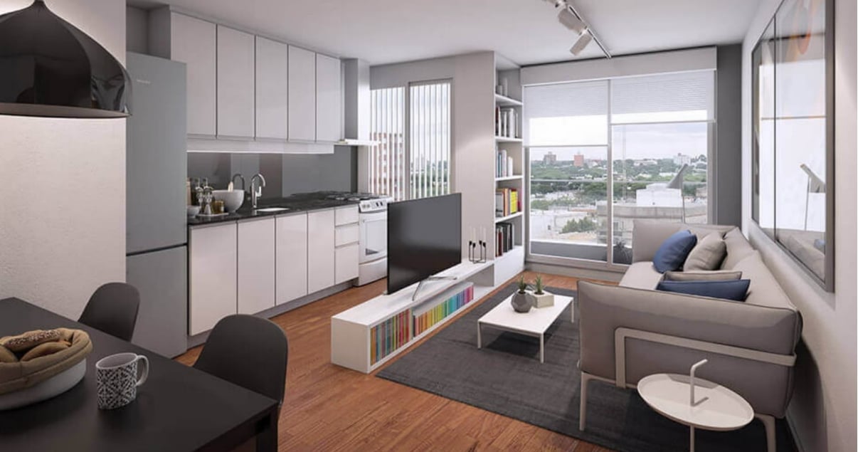 Interior del edificio MET Parc Living cocina y comedor con muebles articulos electronicos y decoraciones