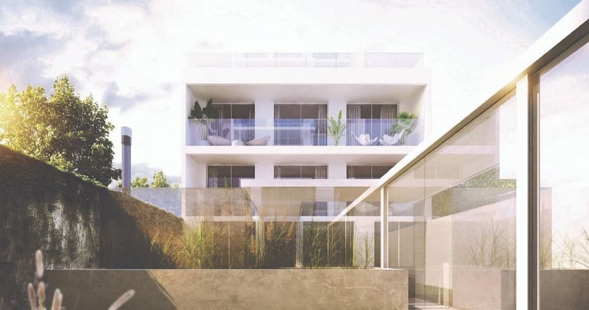 Exterior del edificio Bartolito con balcones vidriados del estudio de arquitectos Paggi y Zinno