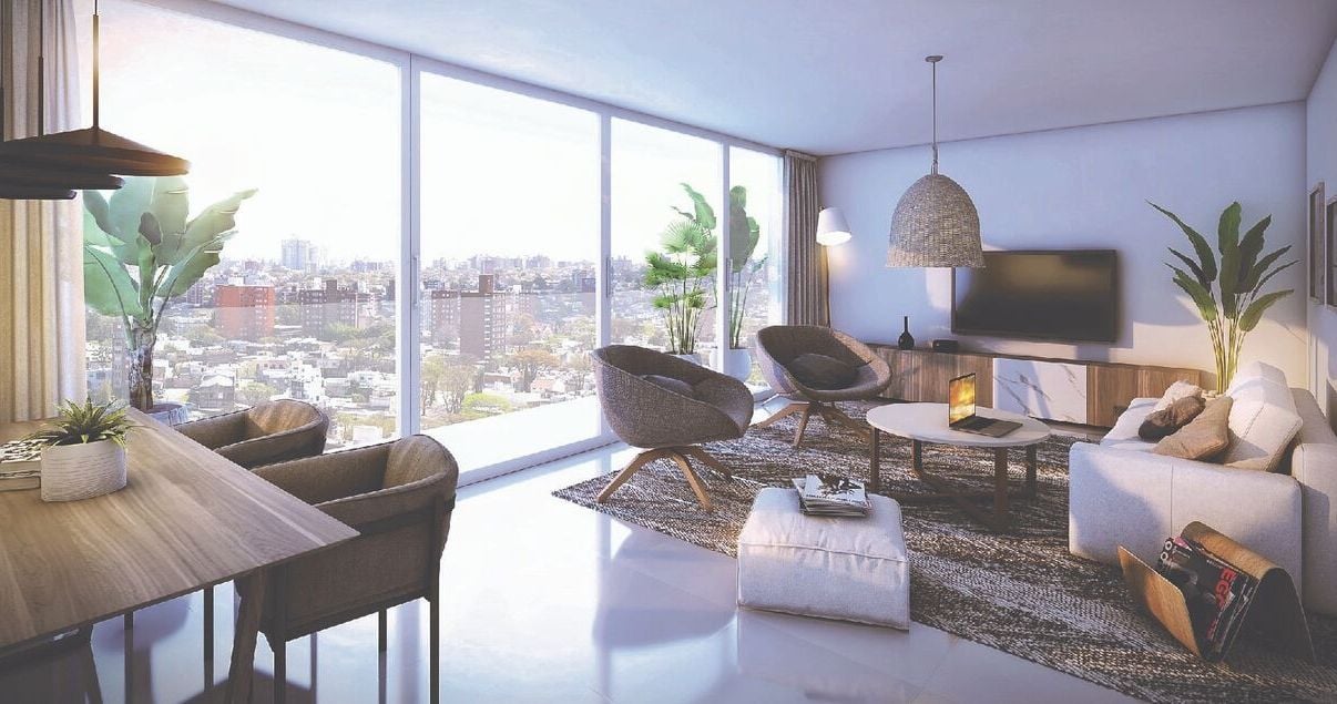 Interior de un apartamento del edificio Bartolito con sillones y decoración beige del estudio de arquitectos Paggi y Zinno